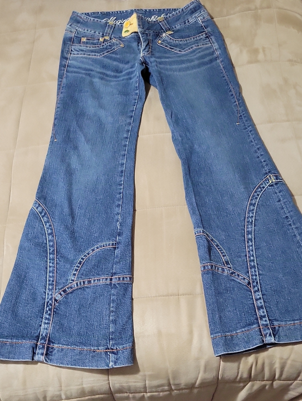 VintagWomen’s Blue Boot Cut Jeans with Curved Panel Detail - (Brand Unspecified)